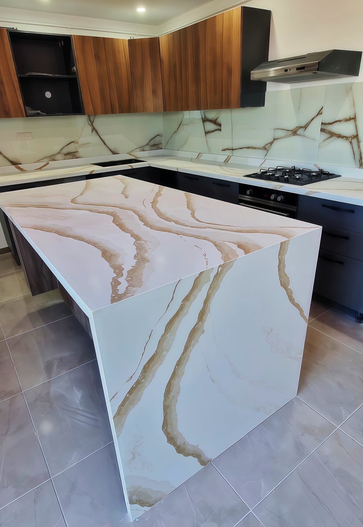 quartz kitchen island project in the Middle East by Aoli Stone white quartz slab with gold veining for island countertop