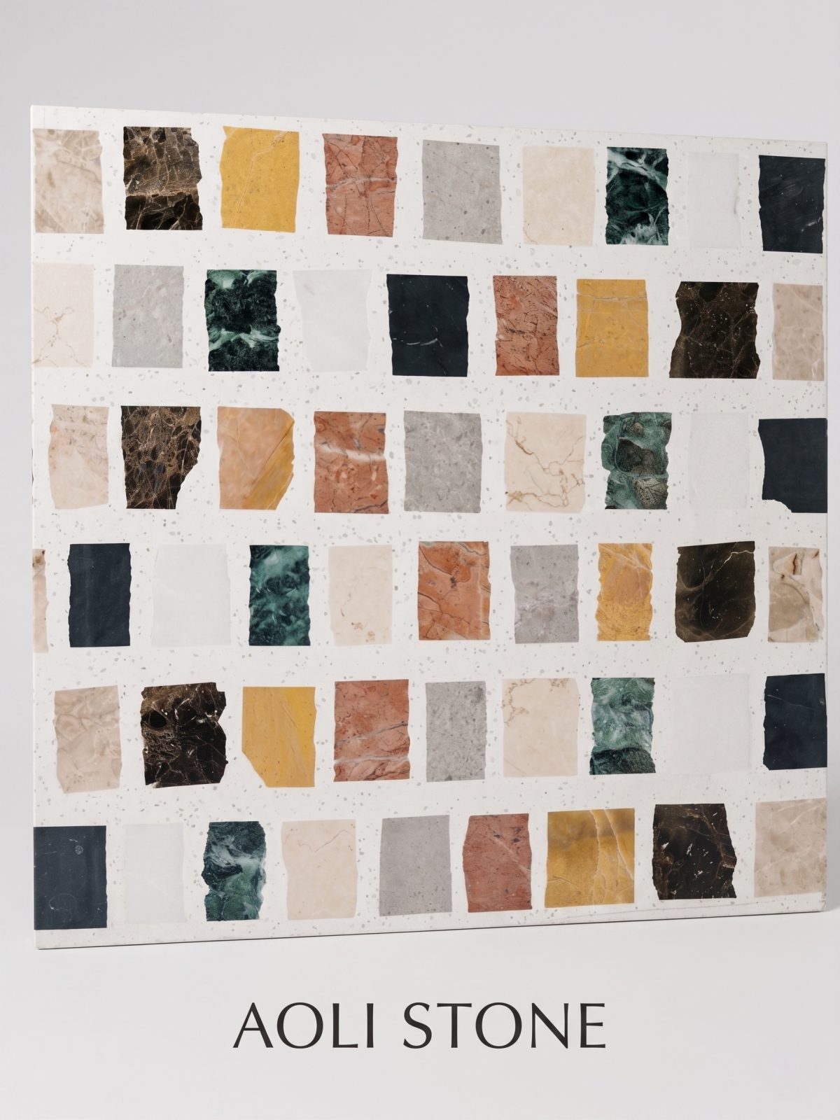 white terrazzo tile with embedded marble square inserts by aoli stone