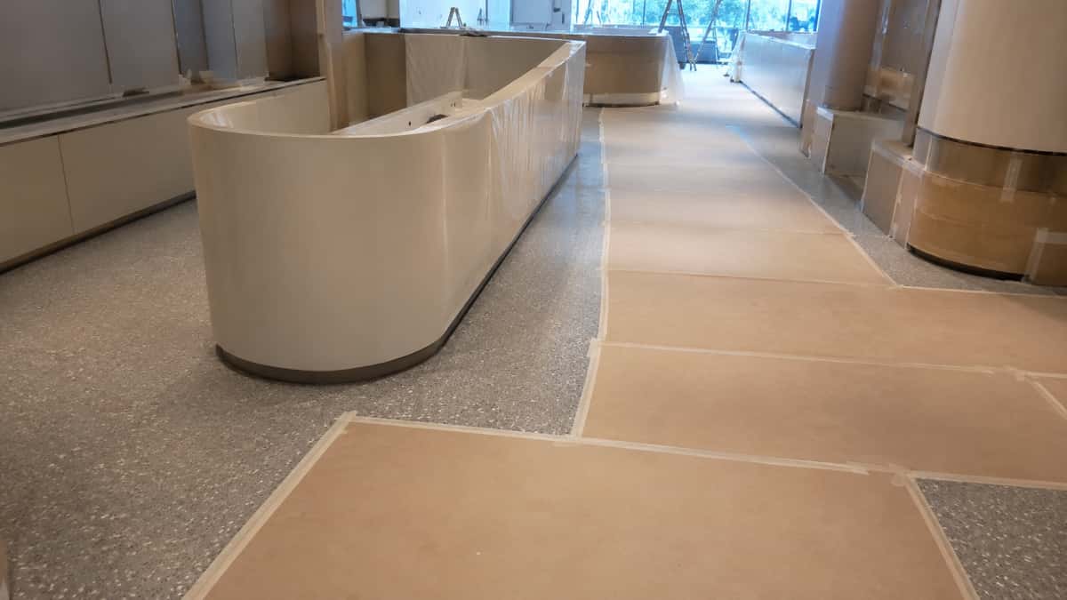 terrazzo-floor-protected-during-project-finishing Terrazzo floor protected during interior project finishing work before handover
