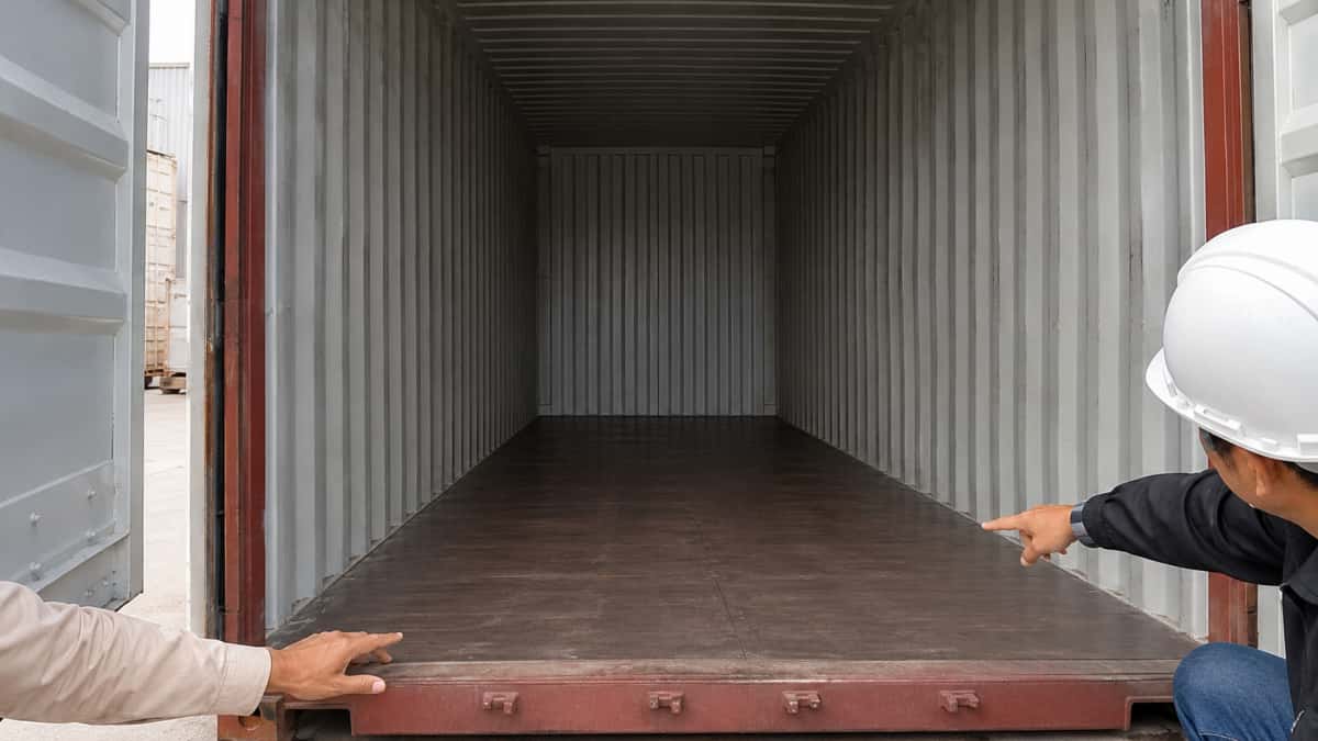 Clean empty container checked before stone crates are loaded