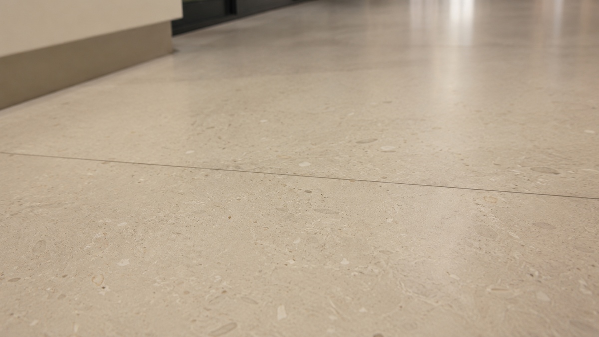 close-up-artificial-marble-corridor-flooring-texture Close-up of artificial marble corridor flooring with controlled stone texture for commercial interiors