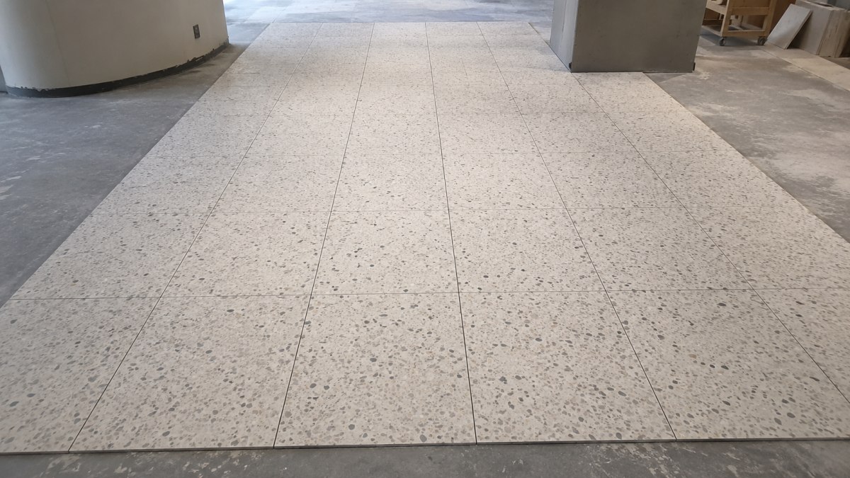 Repeatable terrazzo tile layout for a retail flooring material project