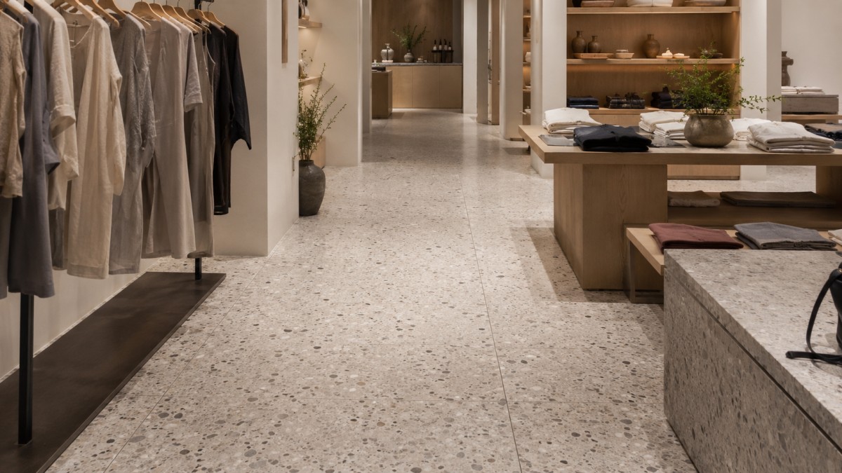 Finished retail terrazzo stone floor with character and repeatable visual rhythm