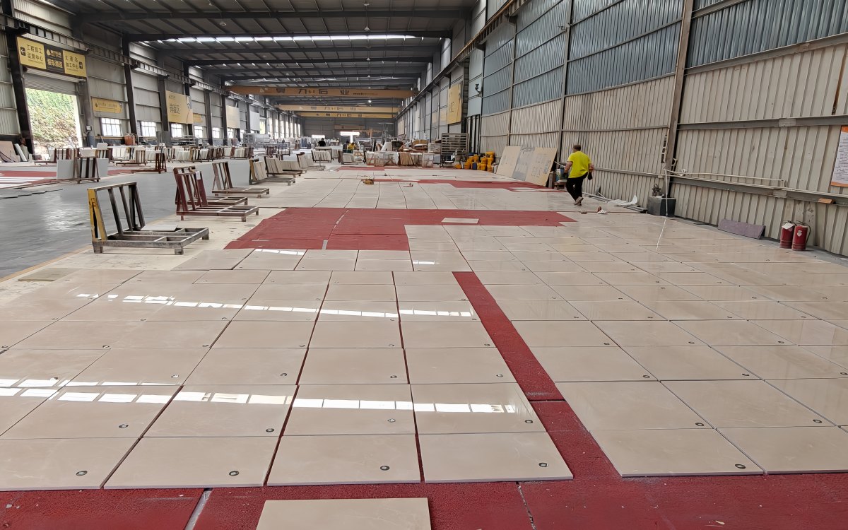 Natural stone panels arranged in factory dry layout before hotel project packing